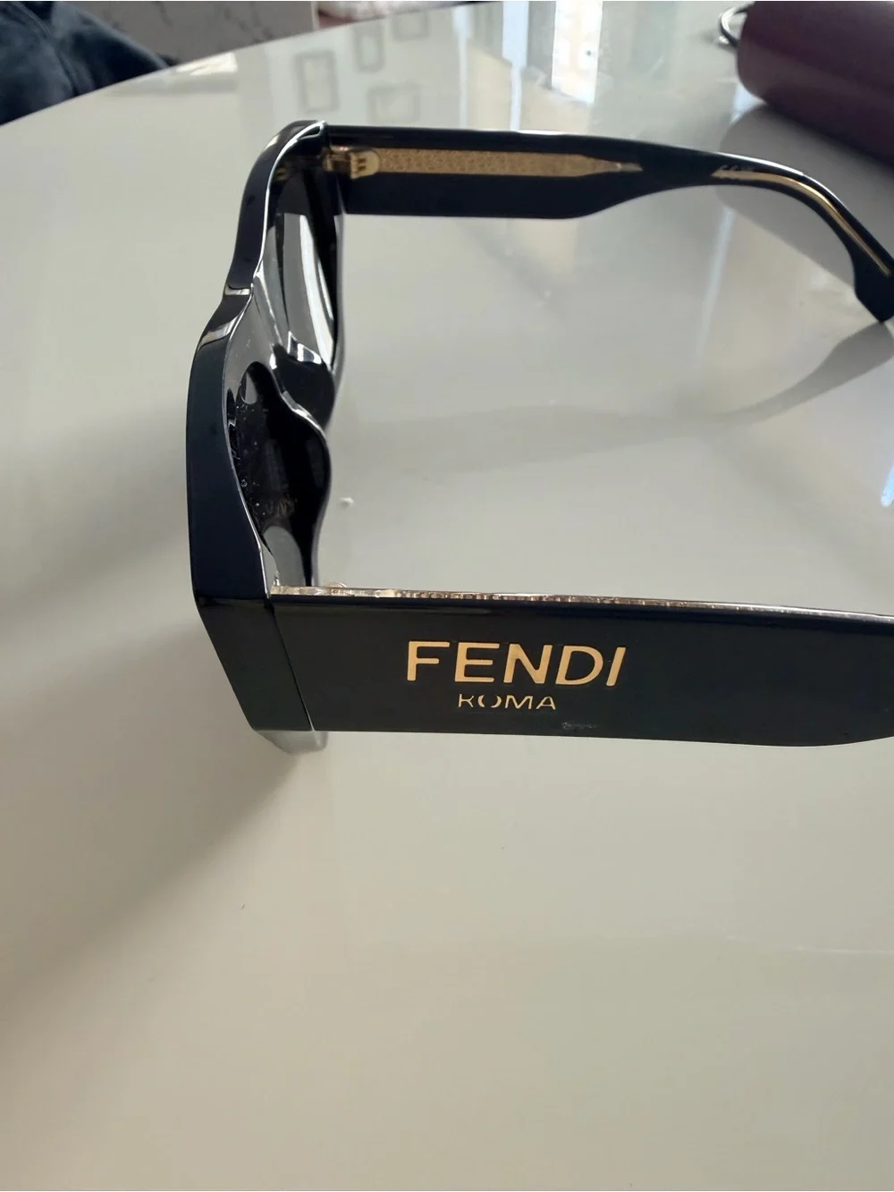 Fendi Black Cat-Eye Sunglasses with Gold Accents